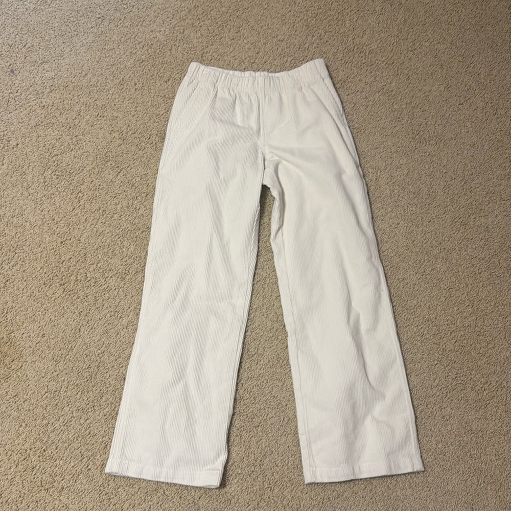 Aritzia TNA cream pants. Size small. One pocket on the back.